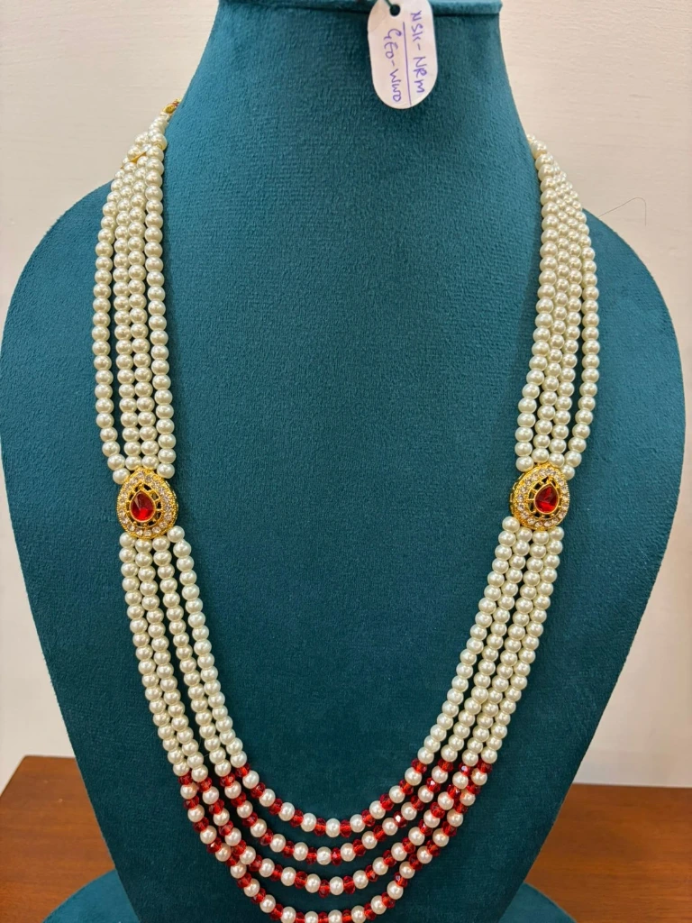 pearl with 2 side pendant and red beads