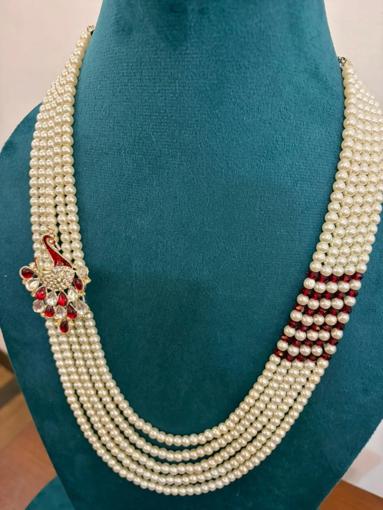 Peakock Pendant with pearls and red beads for party wear and groom